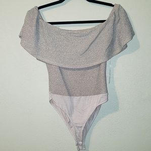 Pink sparkle body suit